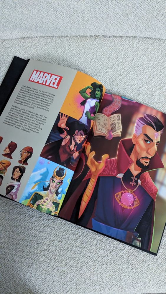 interior pages of an art book. The left hand page reads 'Marvel'. There is a digital illustration of Doctor Strange on the right hand page.