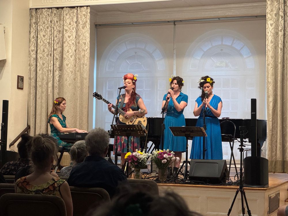 The band “The Flying Vees”, an all woman quartet, on stage at the Philadelphia Ethical Society. 