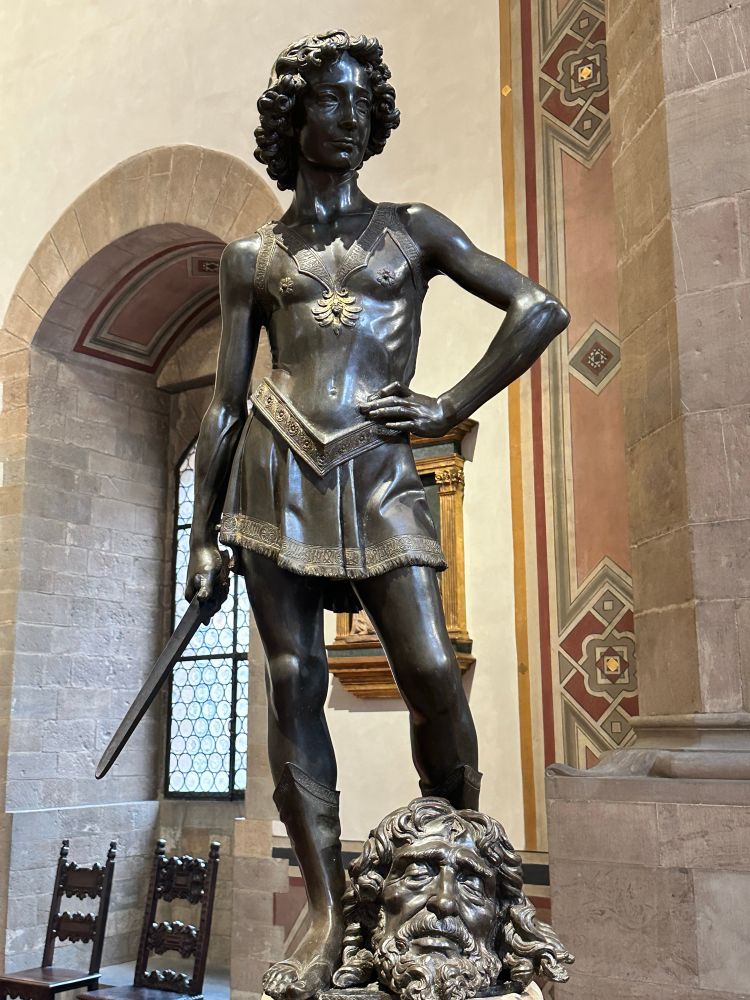 Verocchio’s bronze David cc 1466-1469: says the plaque, “here David is a young man with a proud and spirited expression, satisfied with his victory, as elegant as a page boy.”