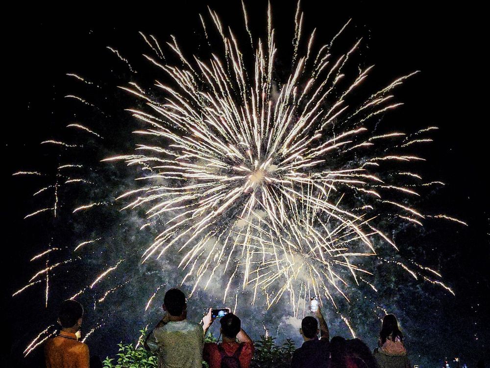 Spectators watch fireworks over the falls in Niagara Falls, Ontario.
