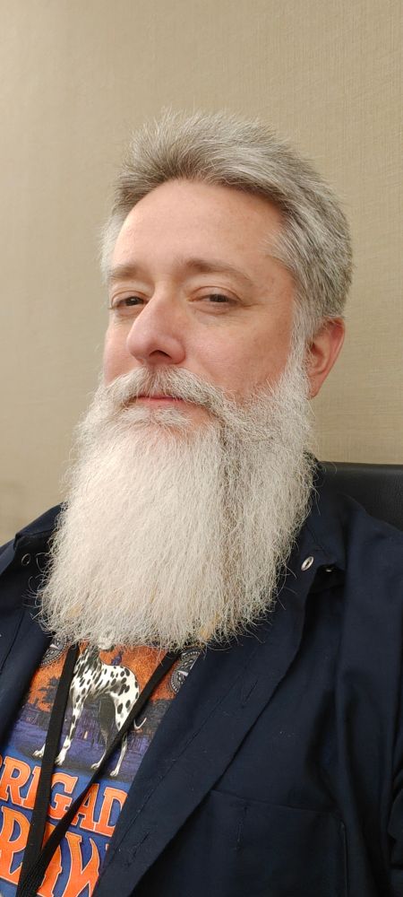 A man with a beard he's been growing for 1 year. Happy birthday, beard.