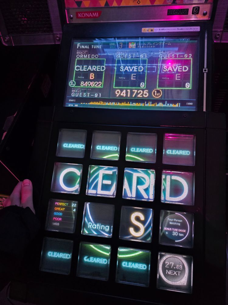 Picture of a jubeat cab. I scored S rank. Missed a couple notes but got most of them right!