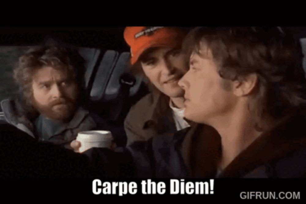 three men in a car with the words carpe the diem