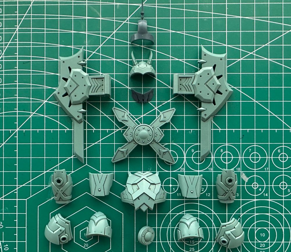 Most of the same pieces from the previous shot. A few navy blues ones are missing. All the pieces present now have dark paint lines on the details, mostly in a dark green color 