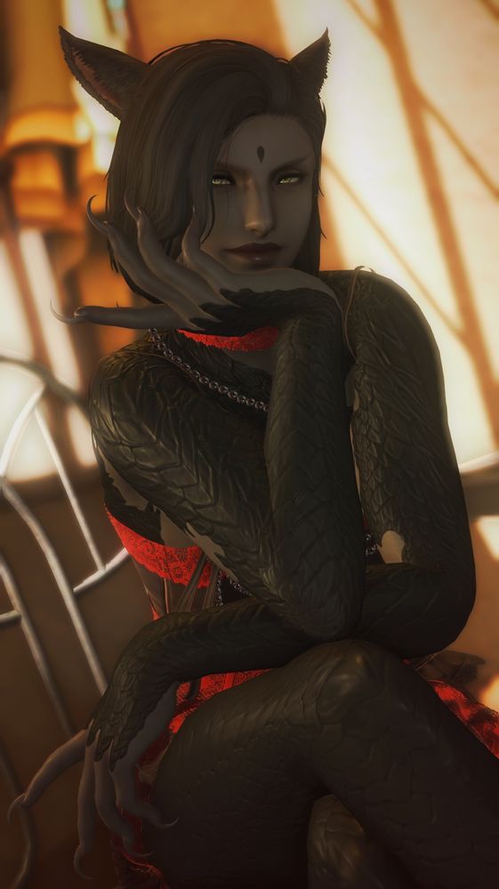 My OC Emil sits with one leg crossed and their head in their hand.