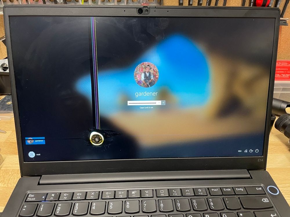 Lenovo E14 with a burn mark on the screen