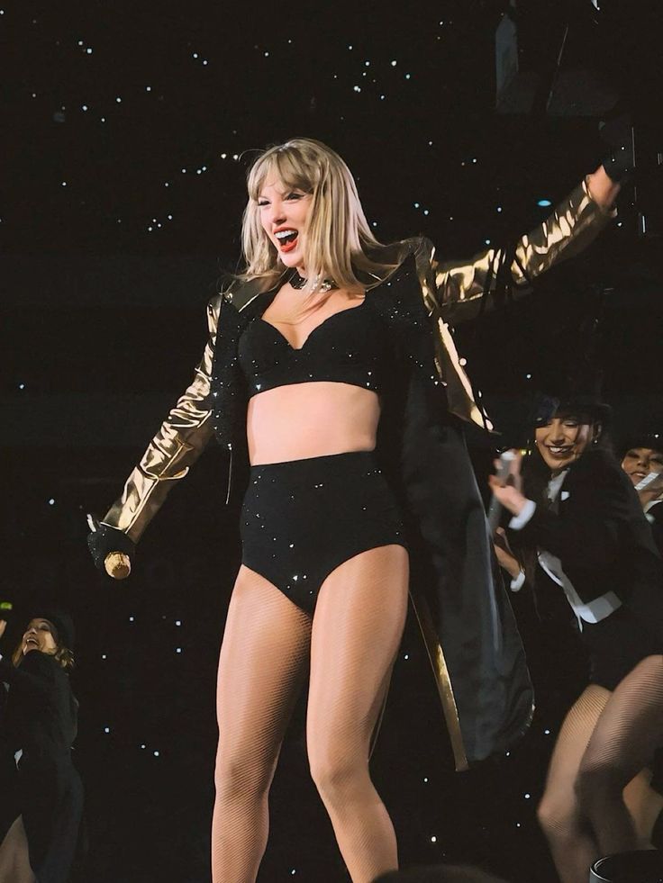 taylor swift on stage at the eras tour during ttpd era