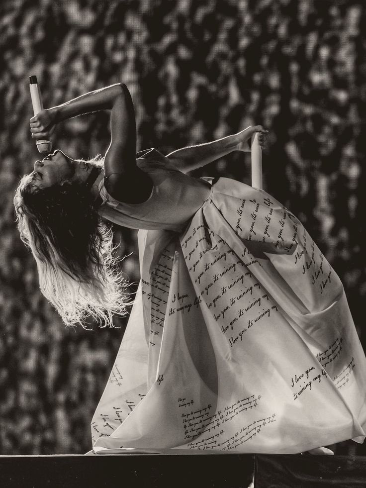 taylor swift on stage at the eras tour during ttpd era