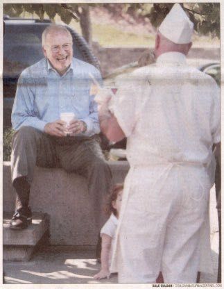 one of the dick cheney bulge pictures from the beginning of the war on terror. it certainly looked like he had a gigantic package (I remember another of these)
