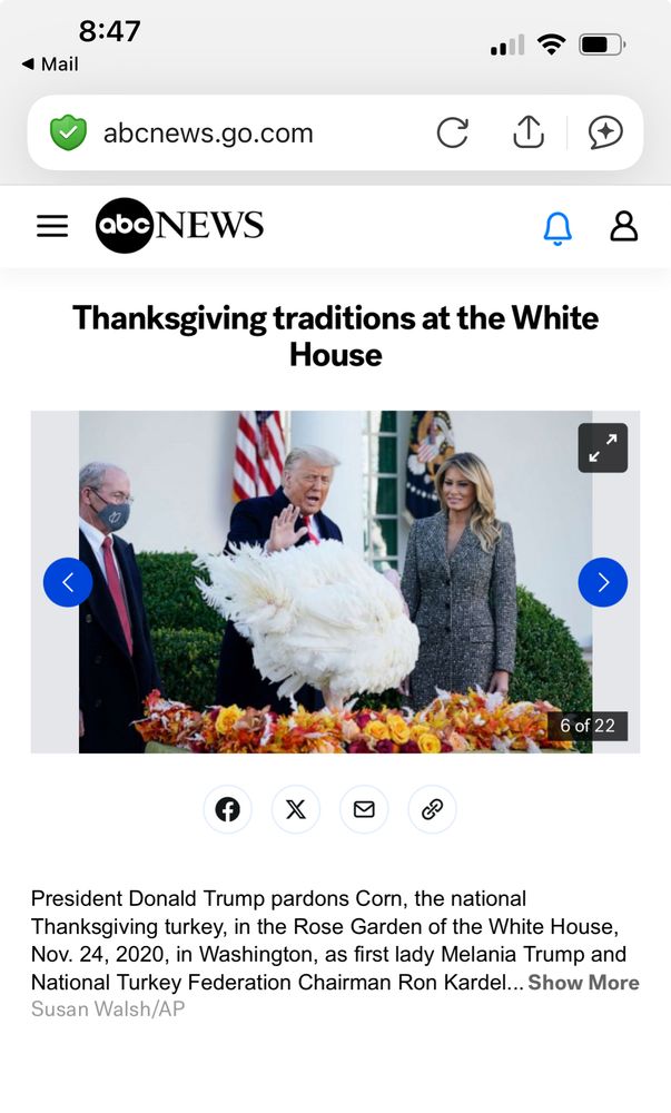 A photo of Donald & Smelania Trump with a turkey to be pardoned on Thanksgiving. There is some random dude in a mask nearby because it was taken in Covid times, 2020