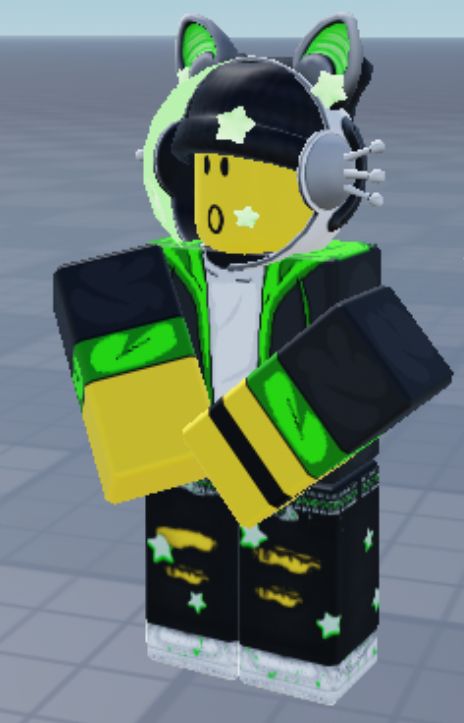 The ROBLOX model of the attached drawing, they are seen looking to the side slightly, with their arms placed infront of their torso, hands being held together. Their mouth reads a cartoony oval, which is used for expressions of slight shock, or surprise.

Please refer to the alt text on the first image for a descriptive explanation of the character’s appearance.