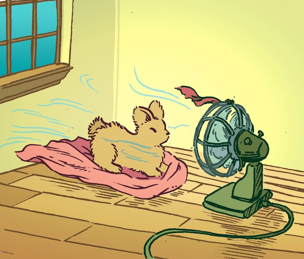 A bunny sits on a large towel in their living room, with her nose right in front of an old-fashioned fan blowing in their face. The cool air ruffles her fur and the towel as well.