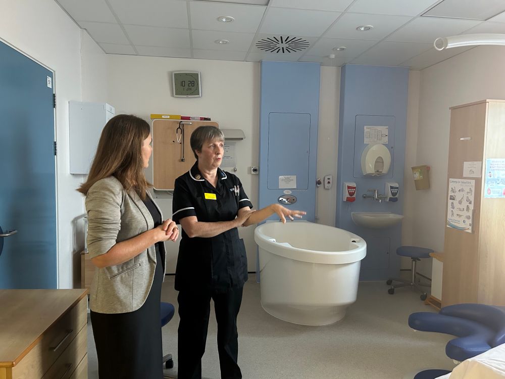 Vikki seeing one of the Haven birthing rooms for low risk, no intervention deliveries, complete with birth pool and delivery chair. Director of midwifery Lorraine is explaining how much bigger these rooms are than when I delivered Molly in 2001