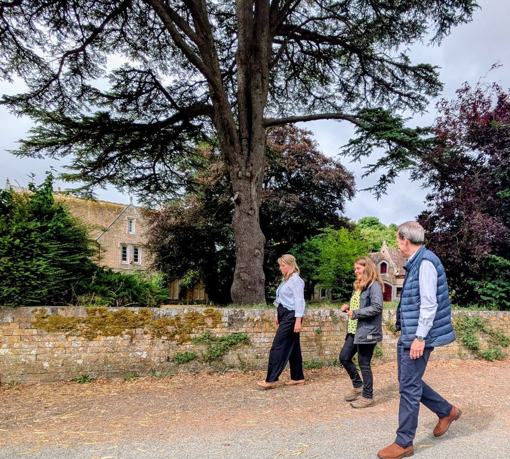 Vikki in walking in Shapwick with a National Trust staff members 