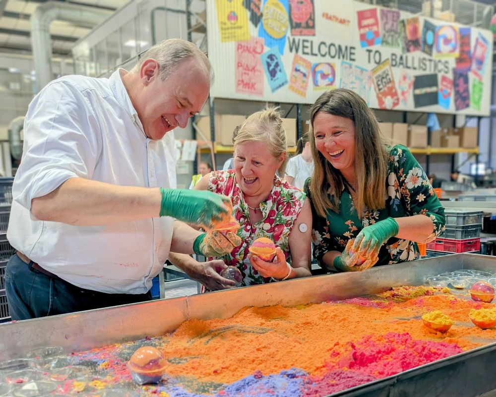 Vikki with Ed Davey and Mo Constantine making bath bombs at Lush 
