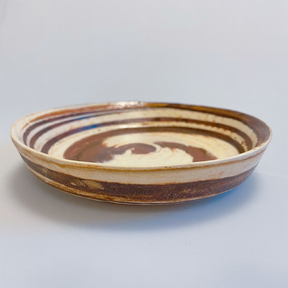 Marbled brown and white clay plate