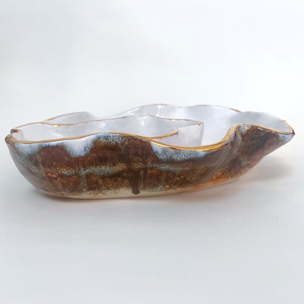 Another side view of the bowl showing an area with drippy glaze