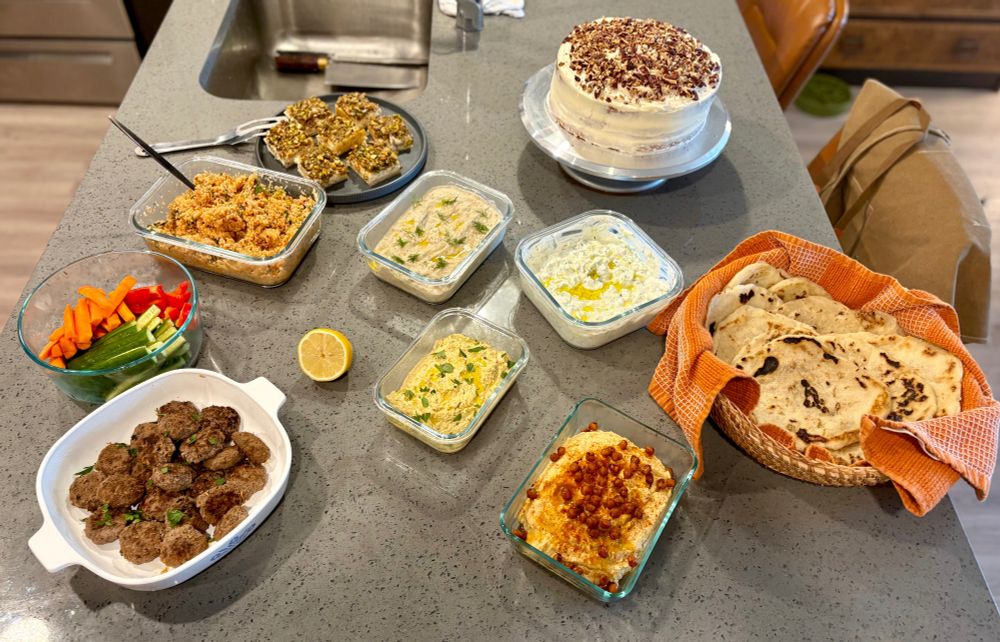 beef shish, veg, kısır (bulgur salad), baklava cheesecake bars, butter pecan cake, pita, humus, paşa ezmesi (spicy feta dip), patlıcan ezmesi (smoked eggplant & yogurt dip), tzatziki