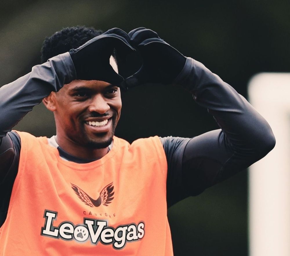 N.Semedo making a heart sign with his hands