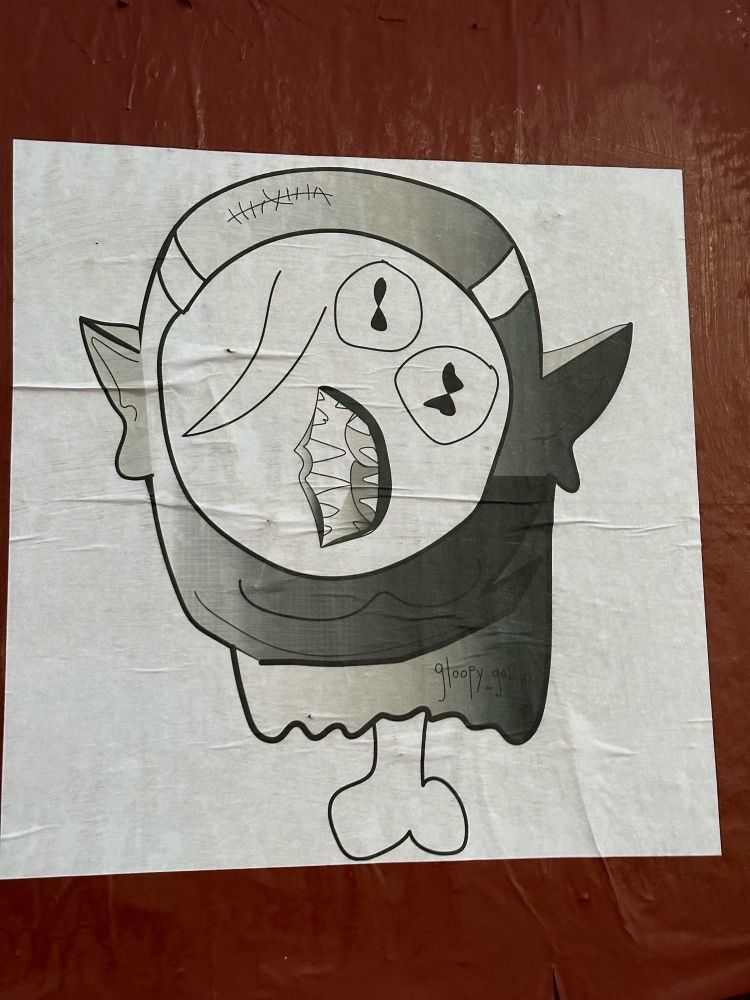 A Picasso-esque drawing a of goblin man but it’s just the head up