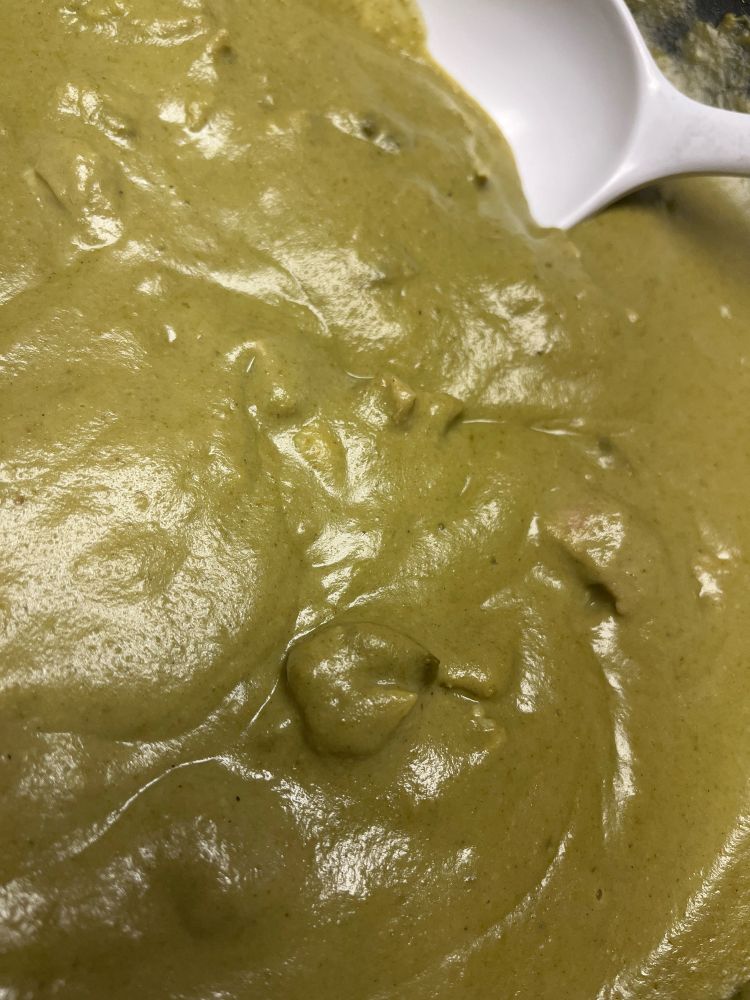 Mole verde and a white spoon