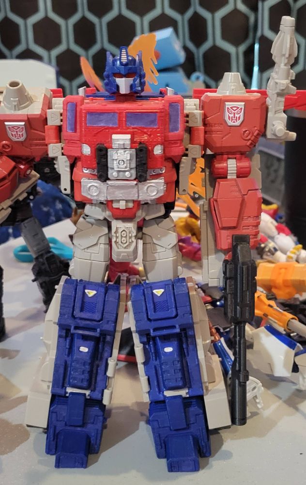 Titans Return Powermaster Optimus Prime in robot mode, with 3D printed add-ons that make it look more like the G1 toy.