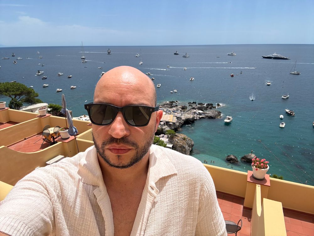 Profile picture in a balcony in front of Marina Piccola, Capri, Italy.