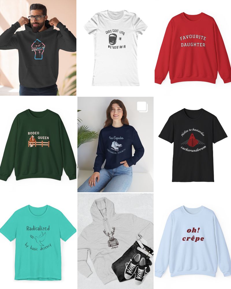 A nine-panel collage displaying various clothing items (hoodies, sweatshirts, and t-shirts) with different graphic designs, likely mockups for a merchandise collection.

Top Row (Left to Right):

A dark grey or black hoodie worn by a man, featuring a pink and blue graphic that says "I AM A VETERAN'S WIFE" (text is partially obscured).

A white t-shirt with black text that reads "GAS COST LESS IN WETASKIWIN".

A bright red sweatshirt with white, arched block letters that read "FAVOURITE DAUGHTER".

Middle Row (Left to Right): 4. A dark green sweatshirt with a graphic of a woman sitting on a fence and text that reads "RODEO QUEEN". 5. A navy blue crewneck sweatshirt worn by a woman, featuring a white graphic of ice skates and text that says "Ice Capades HISTORICAL SOCIETY". 6. A black t-shirt with a white graphic of a red structure (like a tower or bridge) and text in French that reads "Maîtrise bastards Carborundum".

Bottom Row (Left to Right): 7. A bright teal t-shirt with a graphic of two doves and handwritten-style text that reads "Radicalized by basic decency". 8. A light grey hoodie featuring a graphic of a deer's head with antlers rising from a trophy cup. 9. A light blue crewneck sweatshirt with red, script-style text that reads "oh! crêpe".