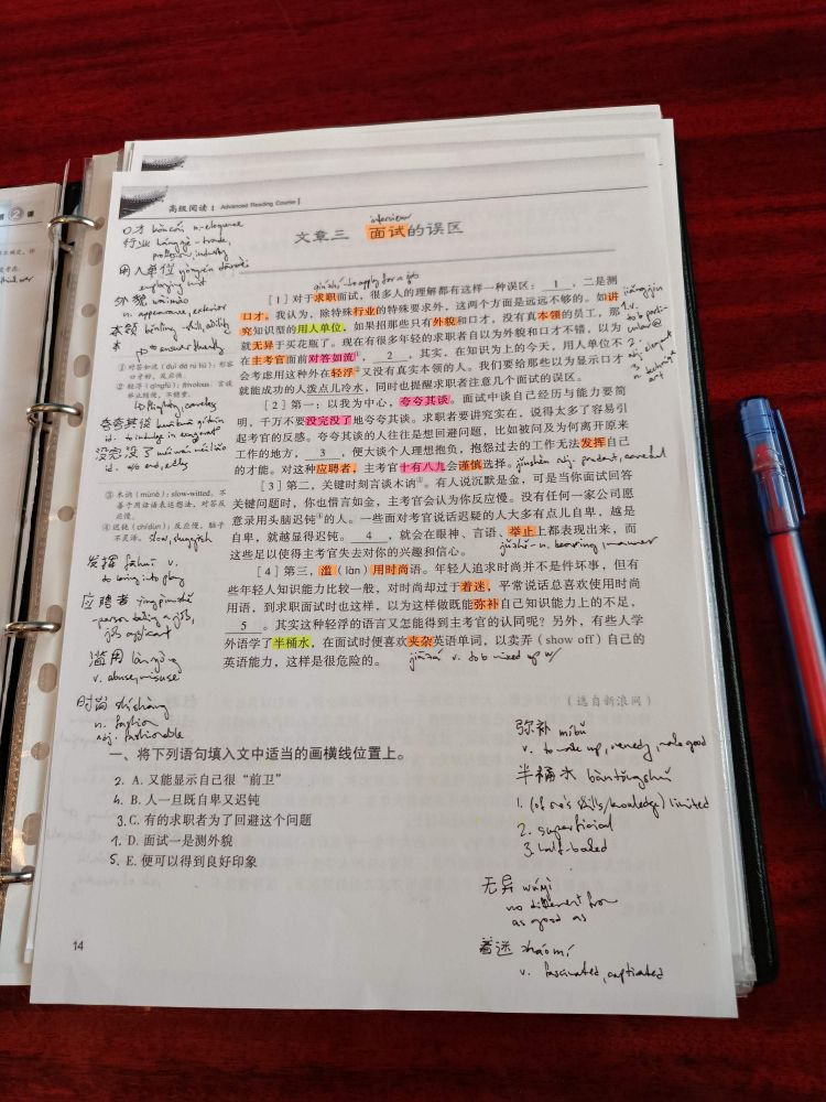 a picture of a sheet of paper with an article in mandarin. the paper has my vocab notes too.
