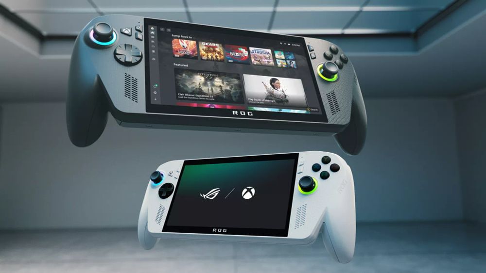 Two handheld gaming consoles, one black (ROG Xbox Ally X) and one white (ROG Xbox Ally), floating in a modern, minimalistic room with a high ceiling. The black console displays a game library, while the white console shows ROG and Xbox logos. Both feature joysticks, buttons, and shoulder triggers.