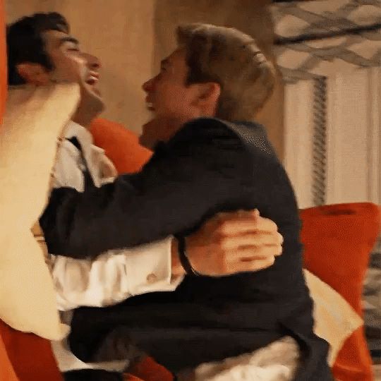 gif of tzp and nick laughing when they fell on the couch in the bts content  we 