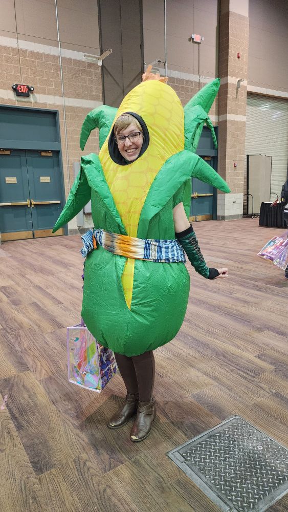 Cosplayer in an inflatable corn suit as the Cornservant from Final Fantasy 14