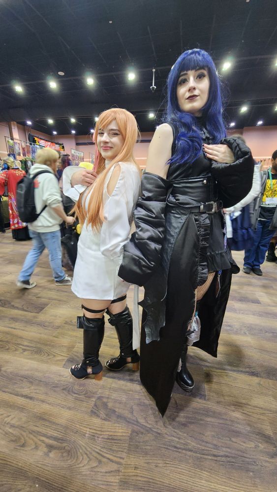 Cosplayers dressed as Ryne and Gaia from Final Fantasy 14