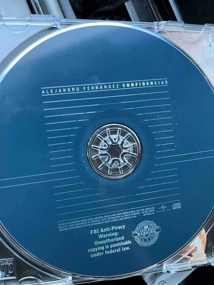 CD of Alejandro Fernández album Confidencias