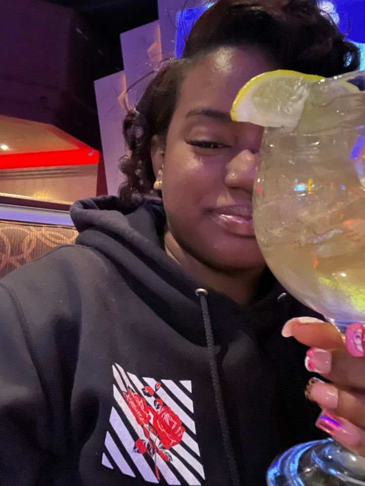 Posing with a margarita goblet as big as my head 