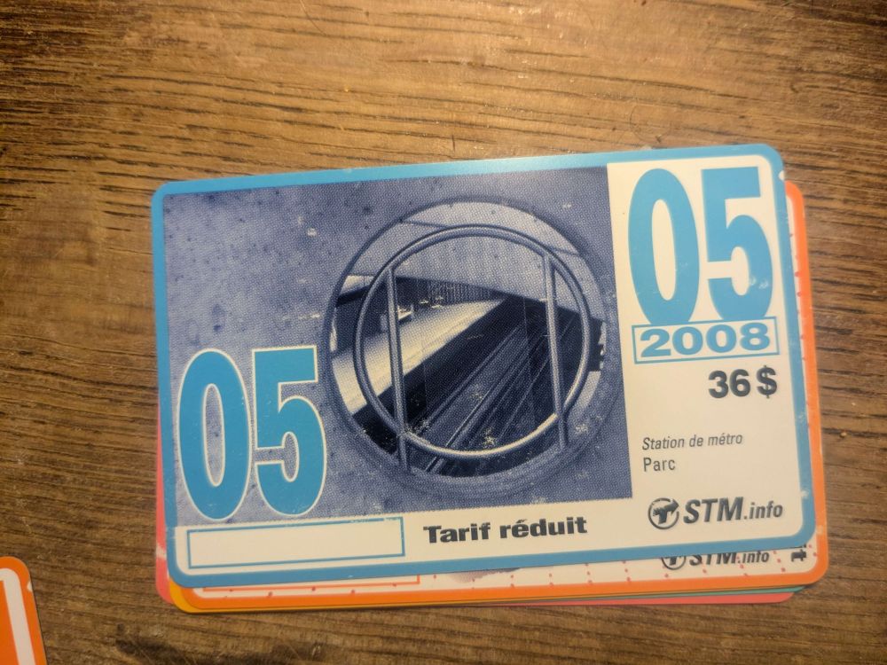 May 2008 reduced fare Montreal bus pass featuring a photo of the tracks through a viewpoint over the tracks at the Parc metro station. 