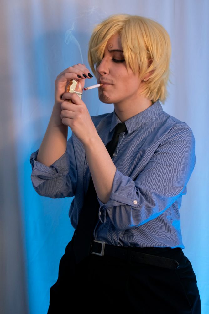 Sanji one piece cosplay lighting a cigarette 