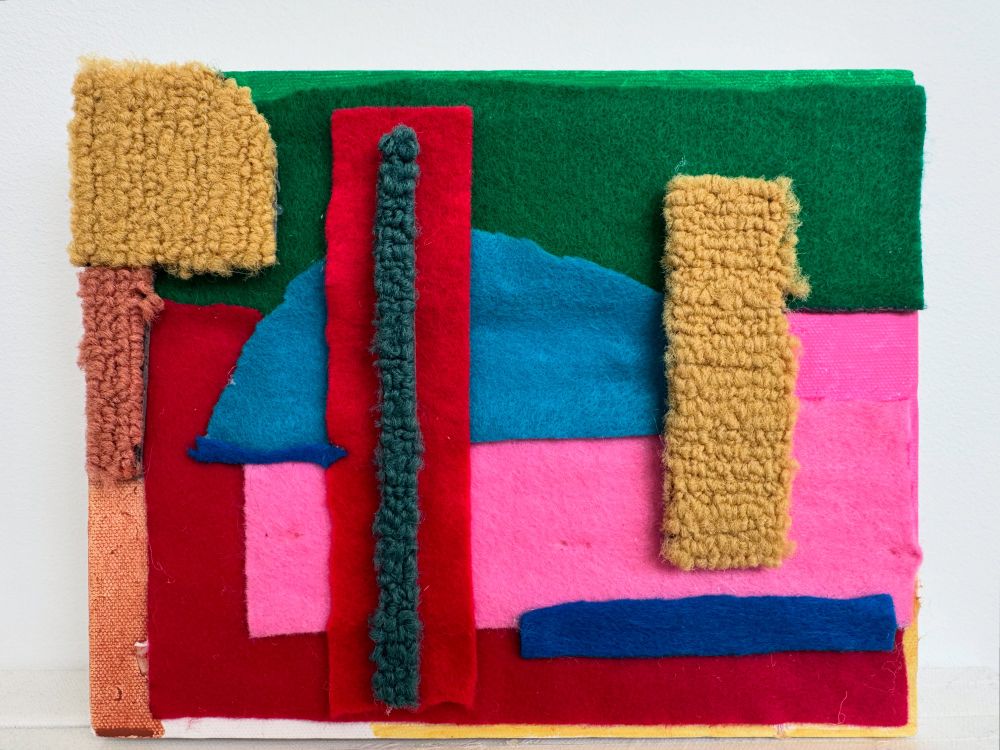 Collage made from cut carpet squares and felt pads glued together.