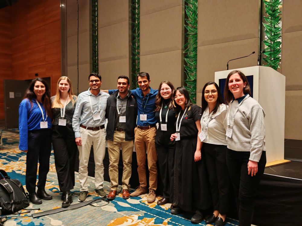 The 9 researchers of the  Ali Lab pose for a group picture at the ESSB conference hall