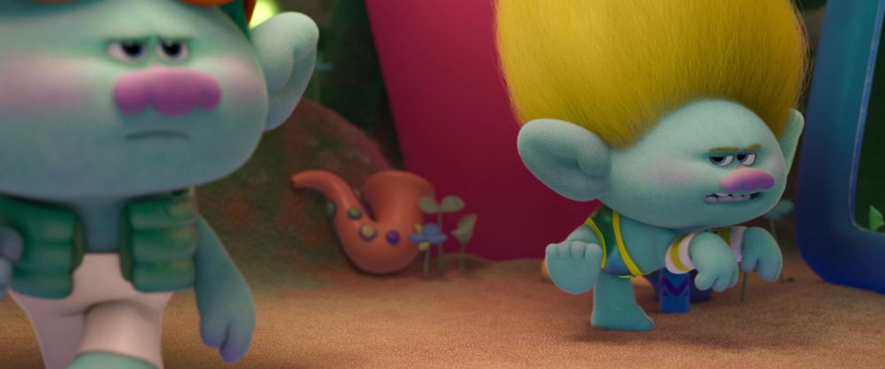 Young John Dory walking out of frame while Clay reluctantly continues his dance practice. He's glaring at John.