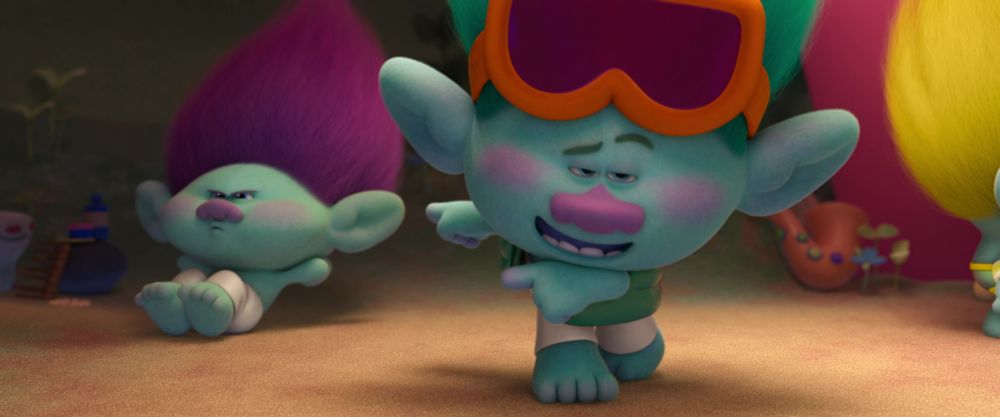 Young John Dory pointing at Bruce while he compliments his abs, saying he "can fry an egg on them".