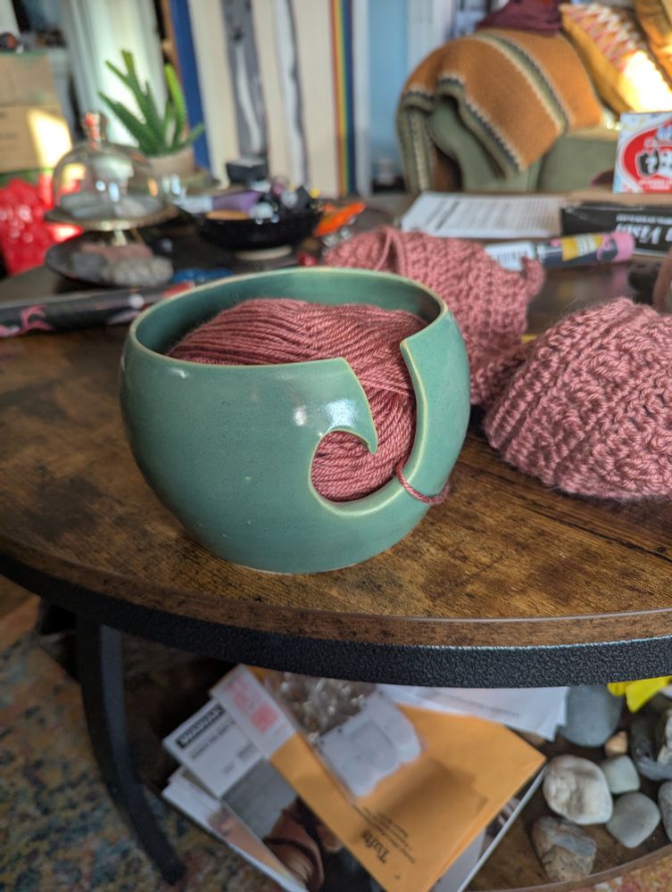 Clown face ceramic yarn bowl teal, red, white glaze