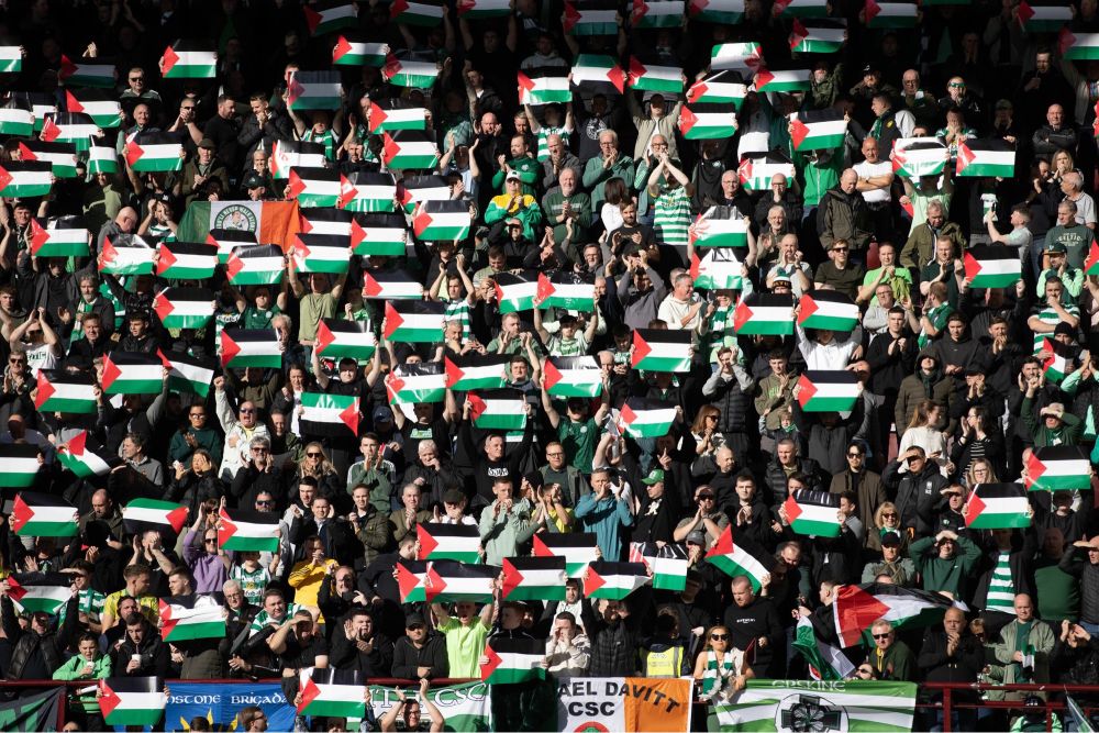Celtic FC supporters in Scotland hold tons of Palestinian flags
