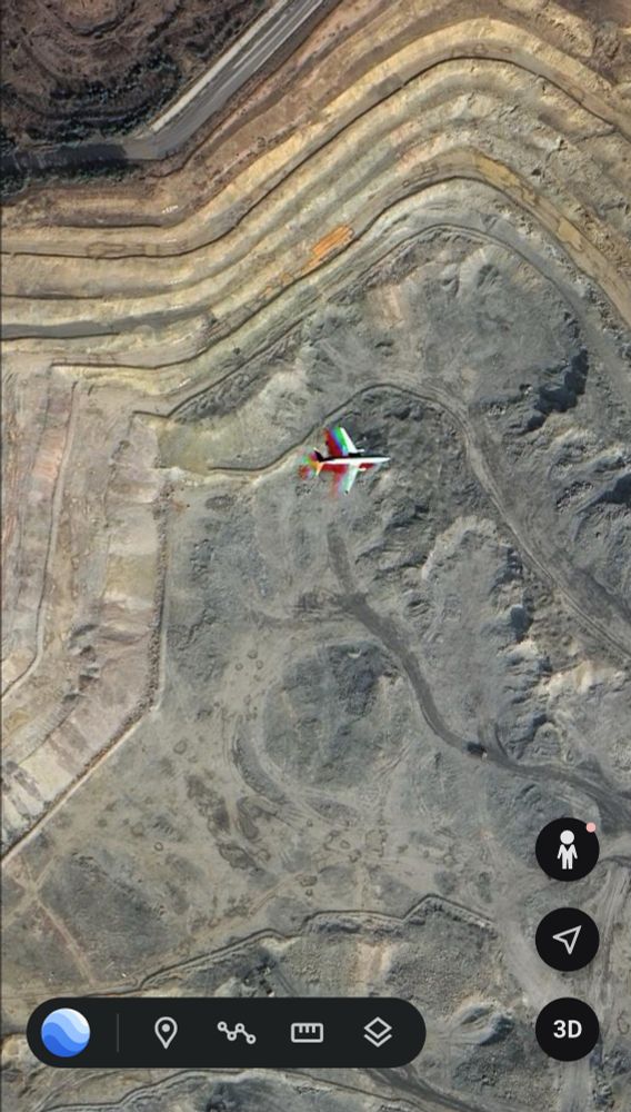 Screenshot Google Earth

Open pit mine with an aircraft in the same image 