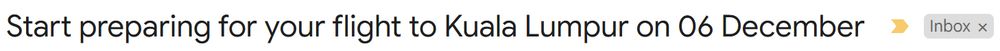 An email subject reading "Start preparing for your flight to Kuala Lumpur on 06 December"
