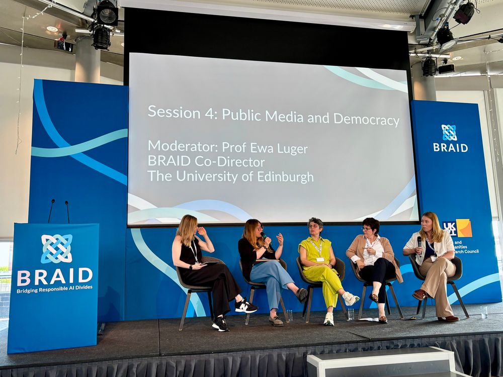 Five panelists seated on a stage branded with BRAID (Responsible AI Divides) and the title Public Media and Democracy