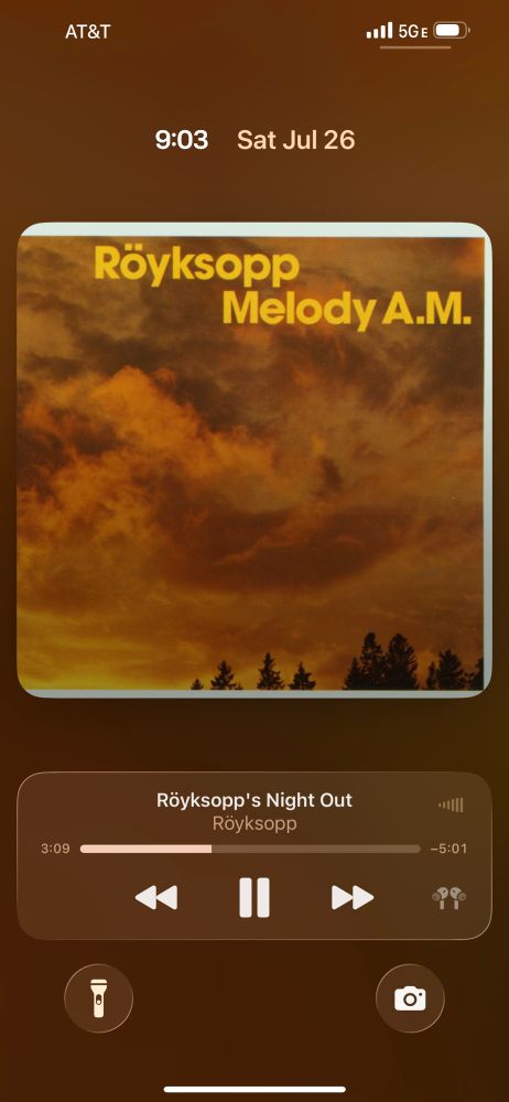Royksopp’s Melody AM on an iOS lock screen. Royksopp’s Night Out is currently playing.
