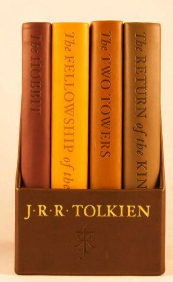 An image of Tolkien's books The Hobbit, The Fellowship of the Ring, The Two Towers, and The Return of the King