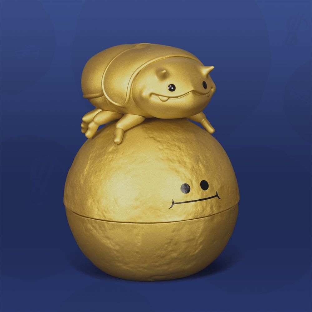 Dungby and Pooba soft vinyl toy set in a metallic gold finish, blue background. by Andrew Bell