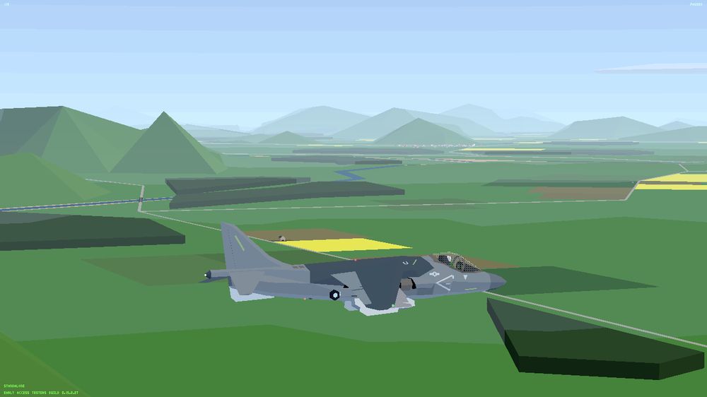 AV8B flying over the new terrain. Hills are in the background, with "forests" and farm fields near.